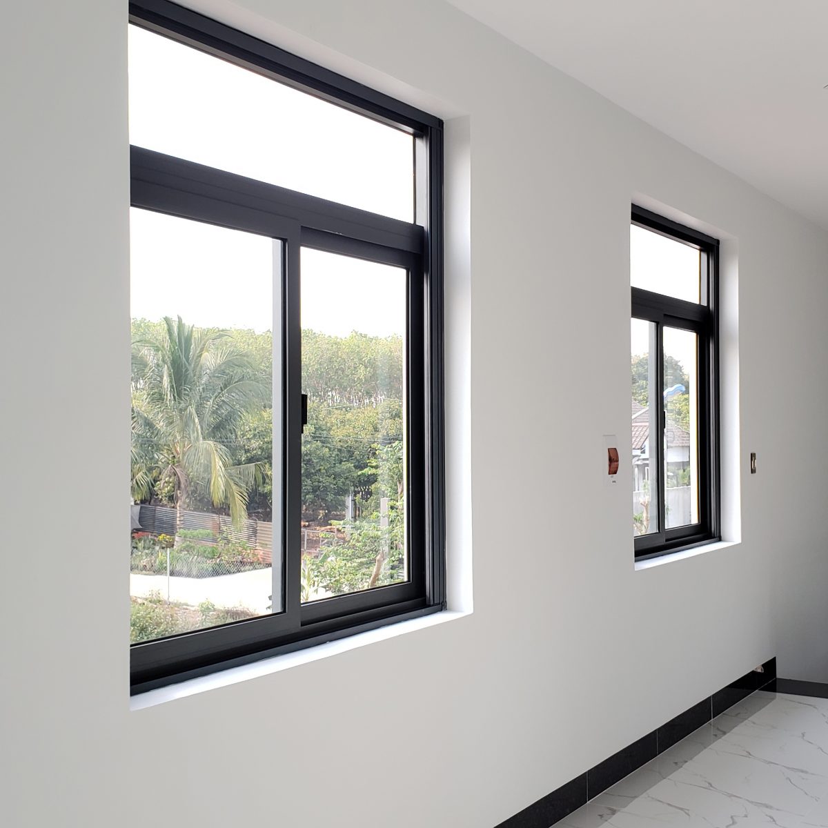 Cửa sổ mở lùa hệ 93 nhôm Xingfa